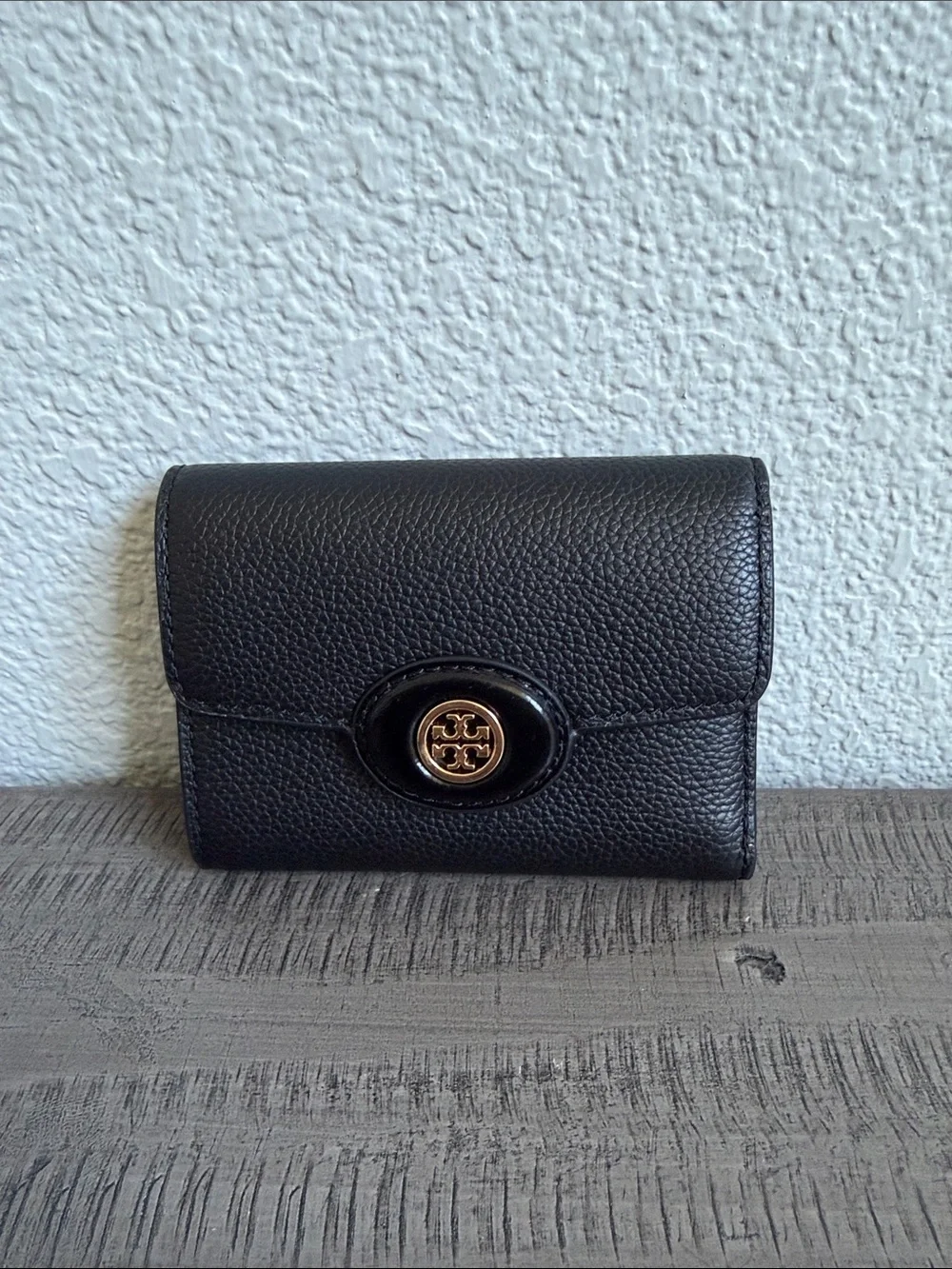Tory Burch features dimensions